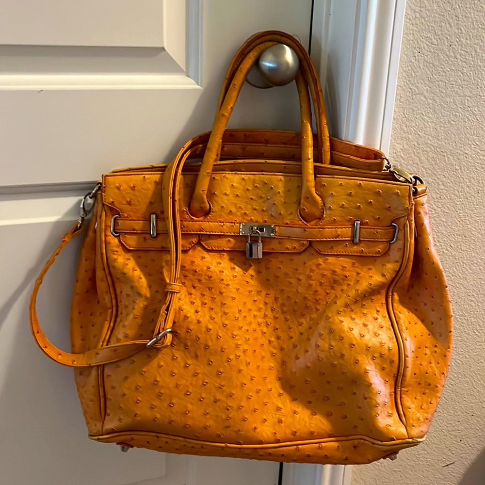 Penelope Ann Orange Faux Ostrich purse.